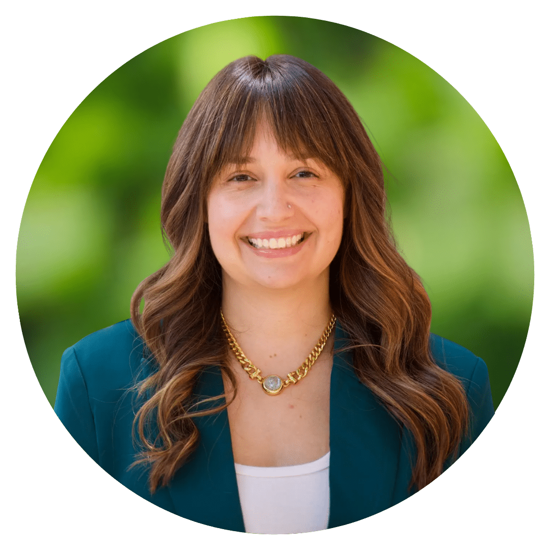Circle cutout of Megan C.'s professional headshot, with a background of leaves